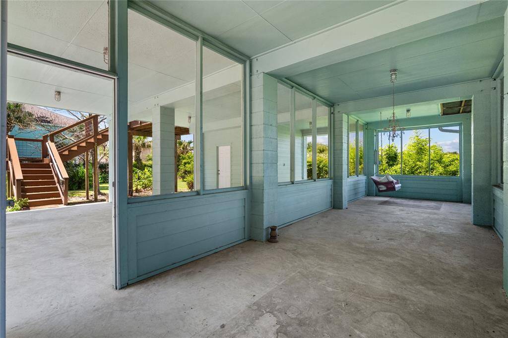 Recreation area with screened in porch.