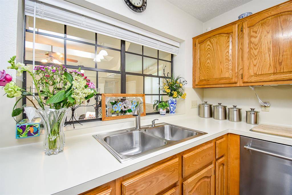 This view from the Kitchen into the sunroom is light and bright