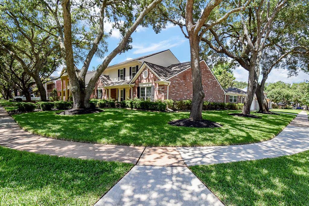 The star of the street! Private corner lot.