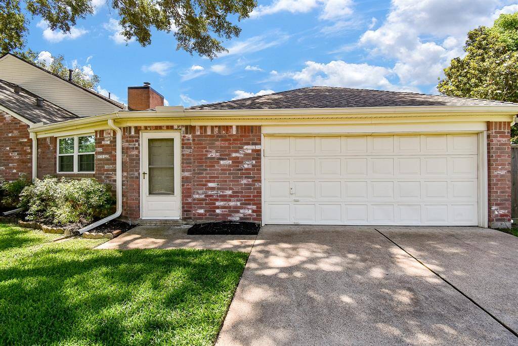 2 car garage with plenty of additional parking space