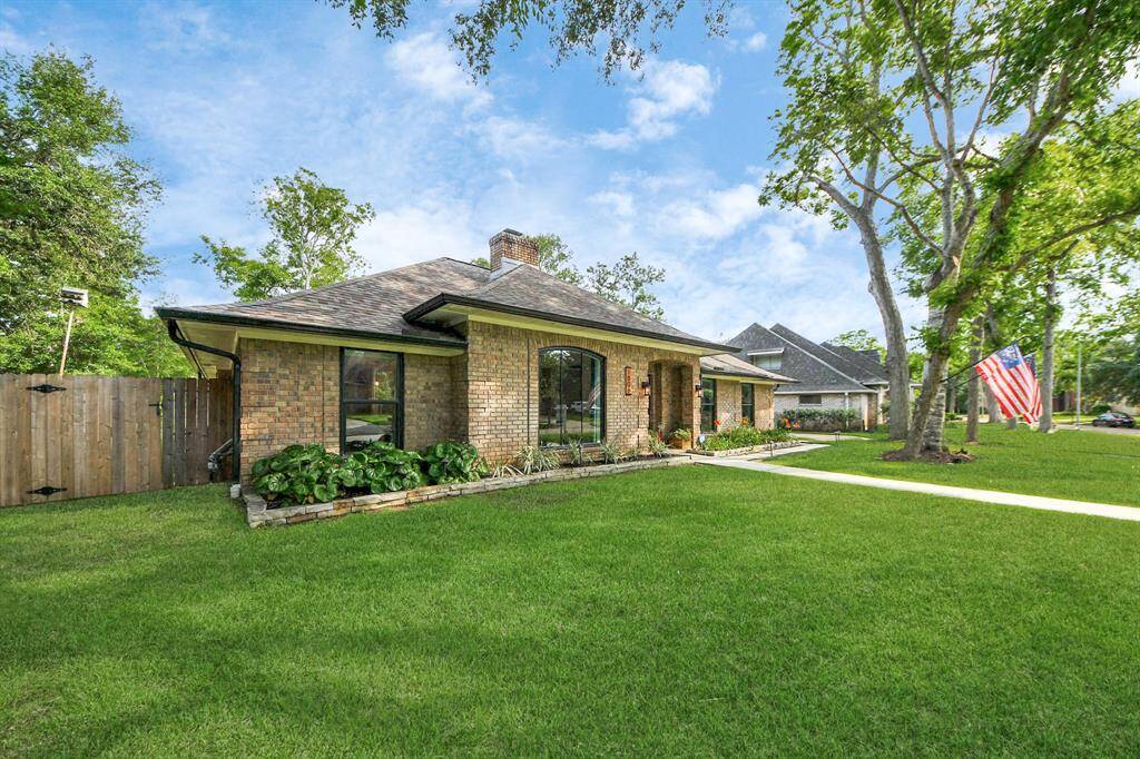 A spacious front yard enhances the home’s curb appeal, all situated on a quiet cul-de-sac for added peace and  privacy.