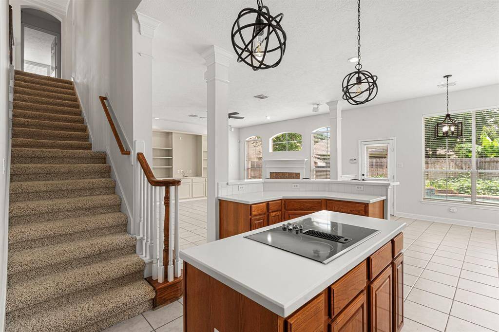 A second staircase off kitchen offers convenient access to the upstairs.