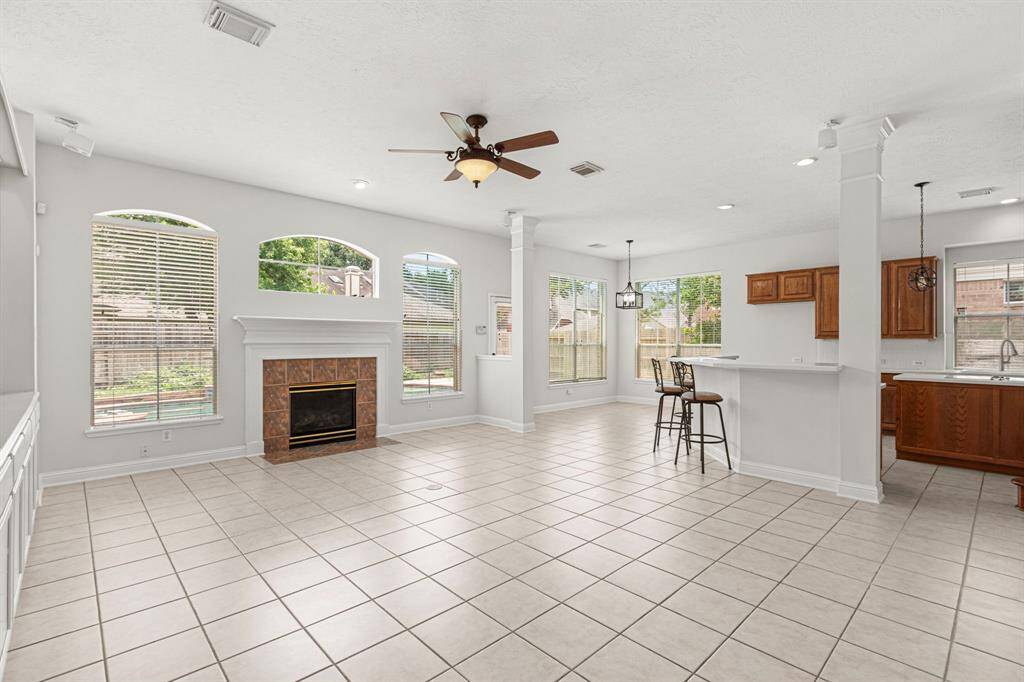 View of family room opening to kitchen