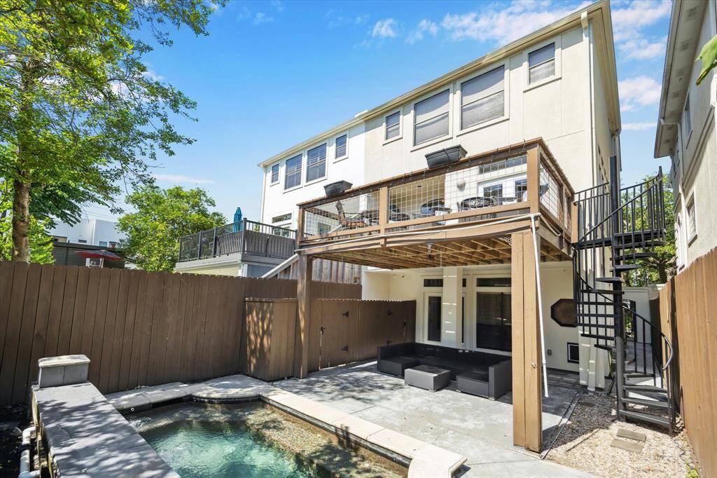 Rear elevation of the three story contemporary/modern townhome.