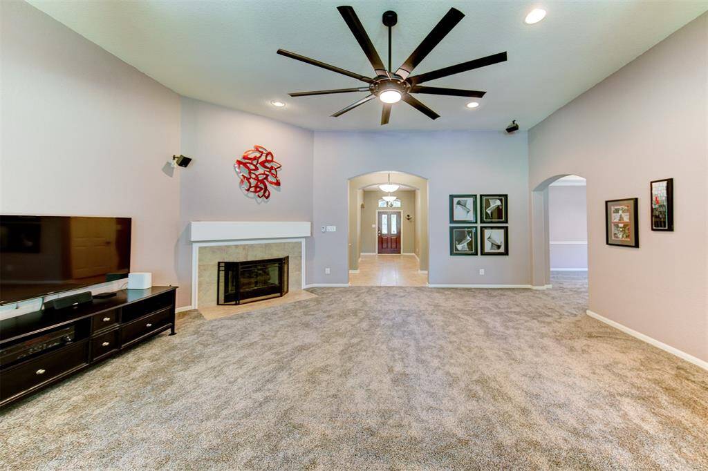Spacious living room complete with gas fireplace