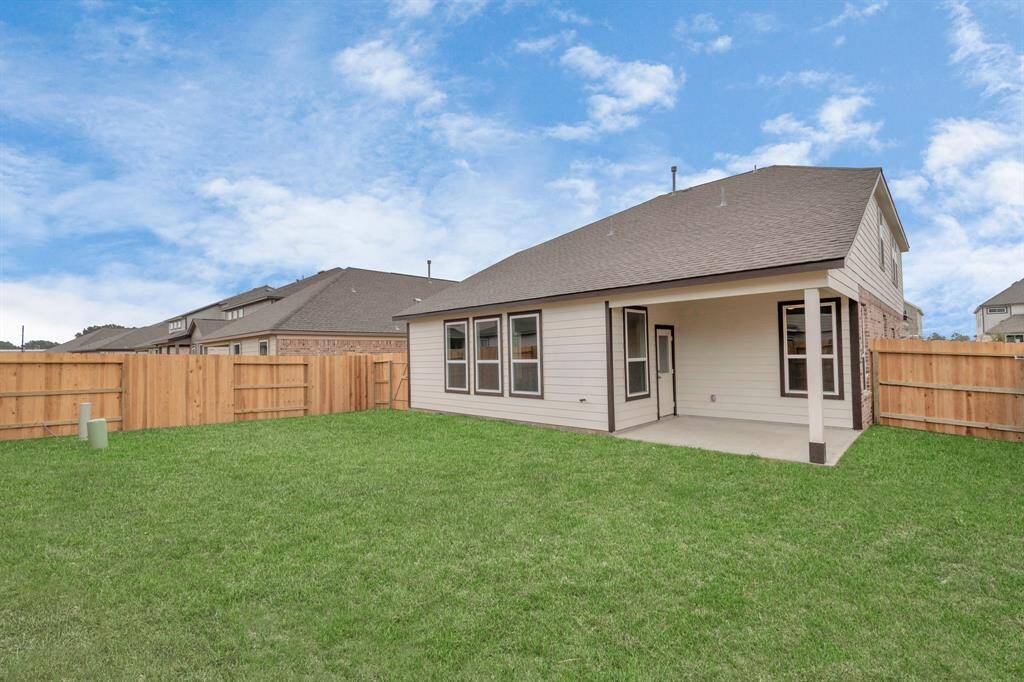 Sample photo of completed home with similar floor plan. As-built interior colors and selections may vary. Step into a world of outdoor possibilities with this remarkable backyard