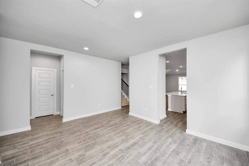 Discover another perspective of this spacious dining space.