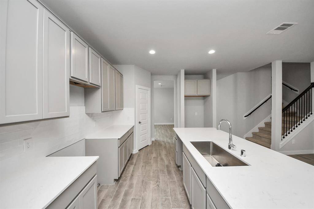 This generously spacious kitchen is a dream realized!