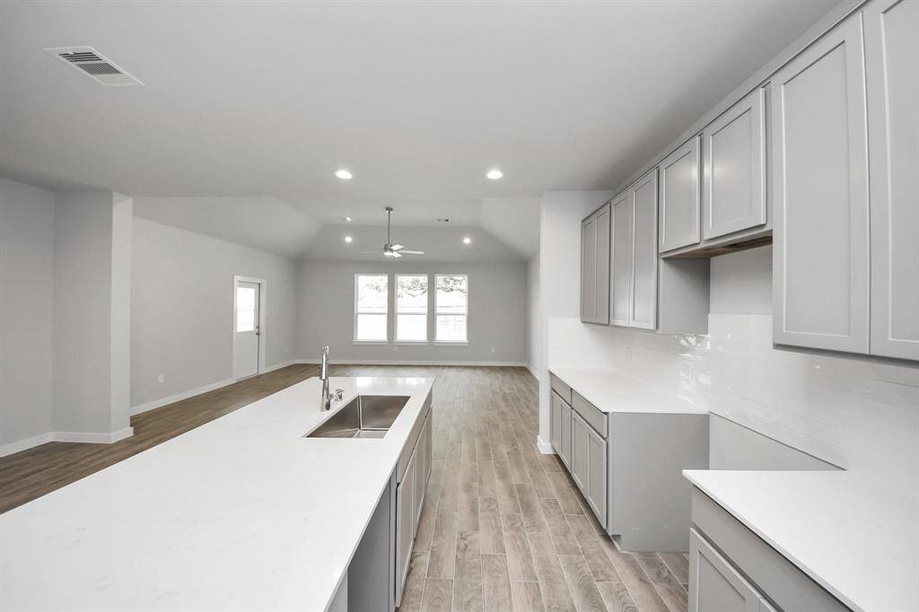 All this opens up to the expansive family room, creating a perfect hub forgatherings.