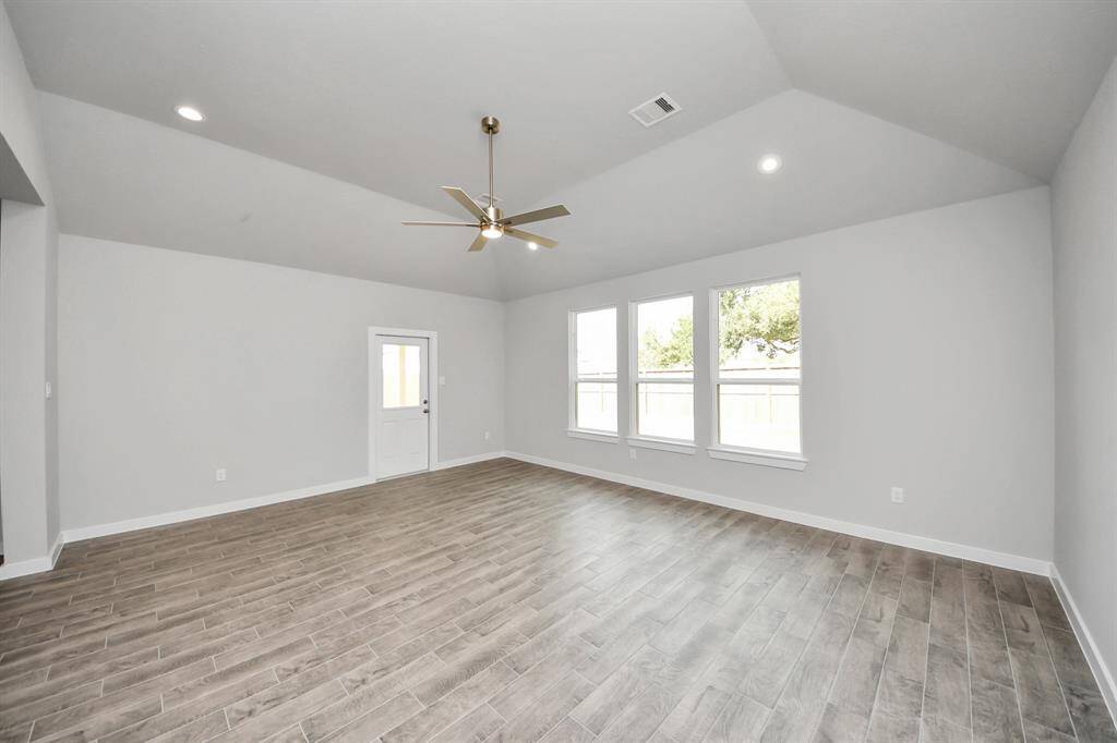 Take another glimpse into the heart of the home with this additional view of thefamily room—a sprawling space ready to accommodate all your gatherings.