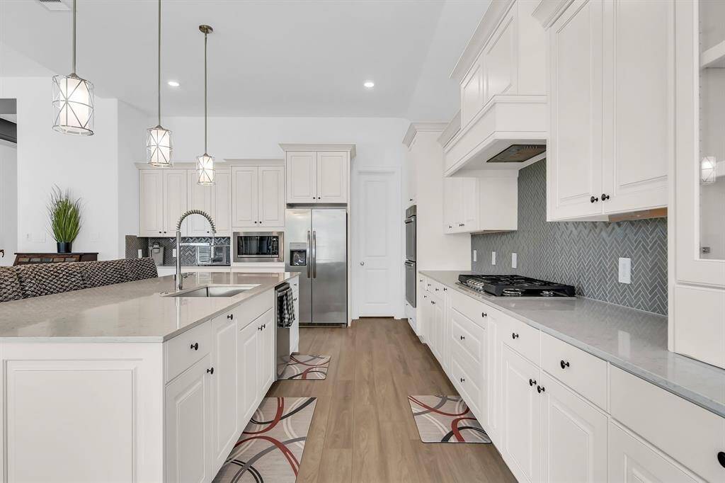 In addition to the 42" cabinetry you have a large walk-in pantry.