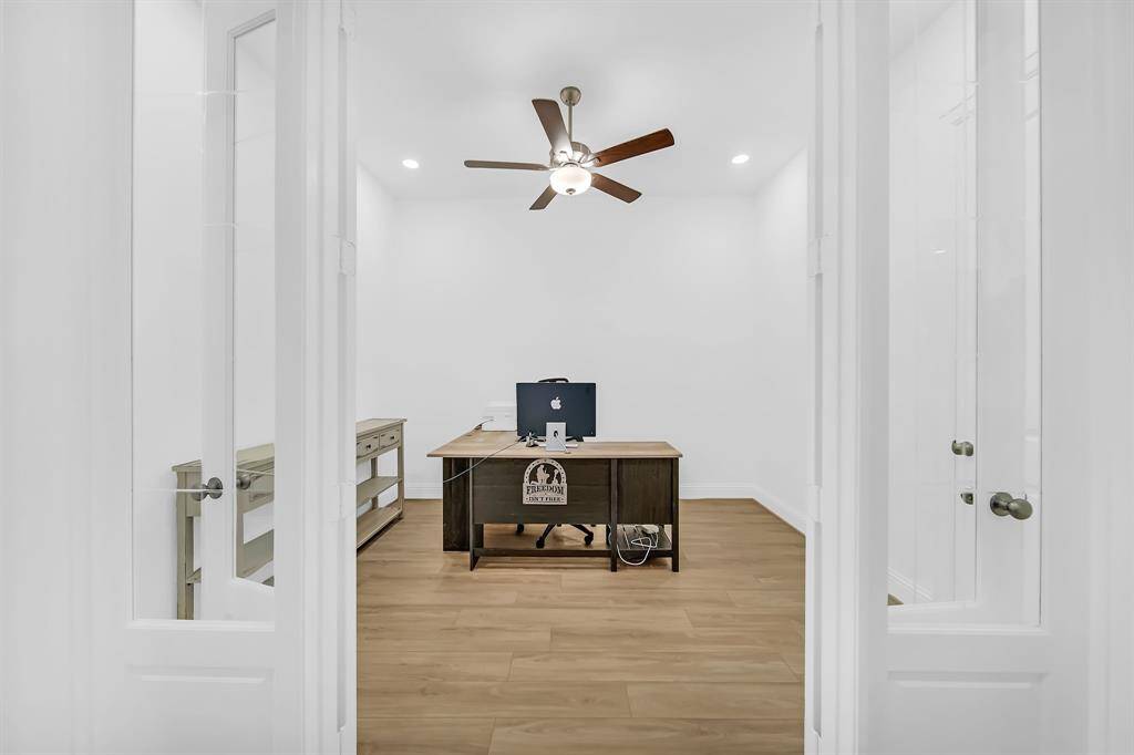 These lovely French Doors lead into your home office off of the main hallway.