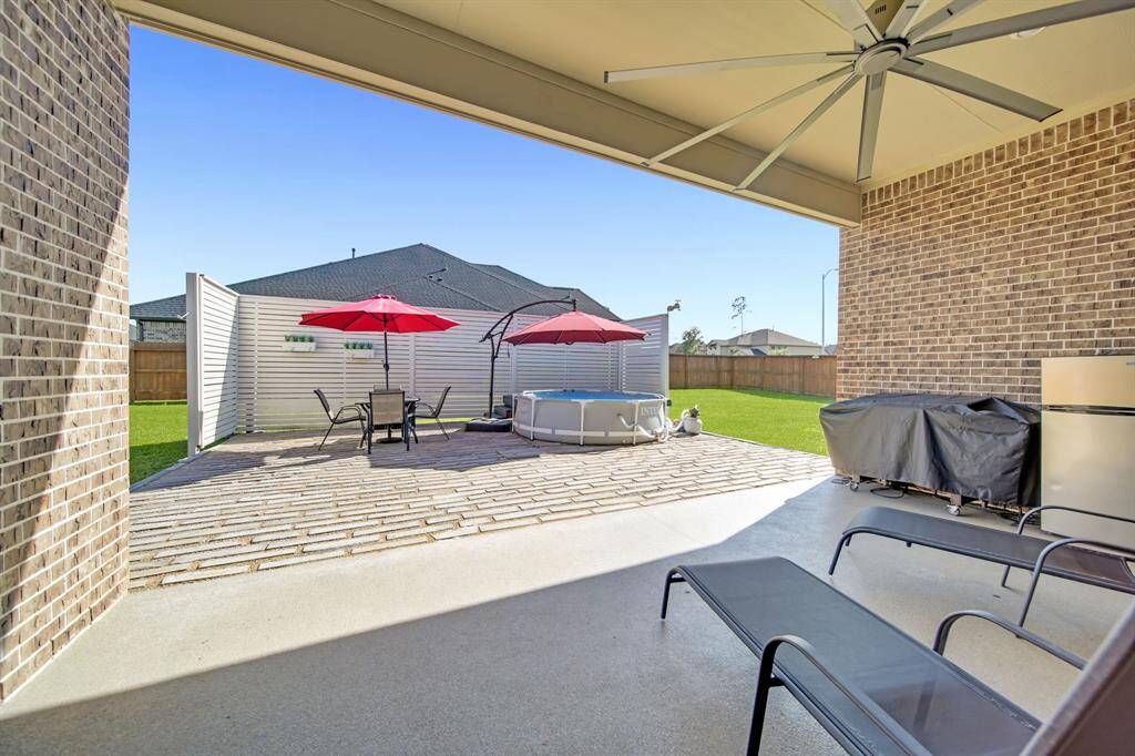 Relax on the covered patio in the privacy of your large fully fenced back yard.