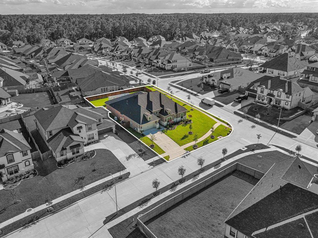 This large corner lot within the gated community of Woodtrace is the perfect spot for this Next-Gen floor plan!