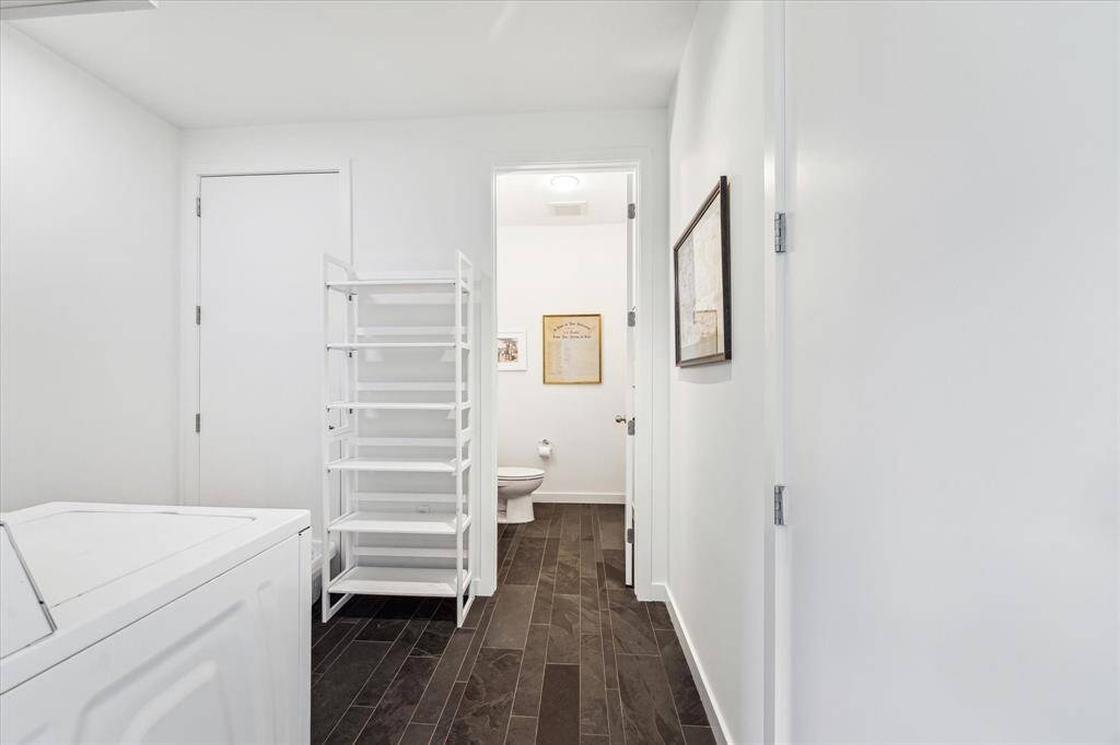 First floor utility room with powder room