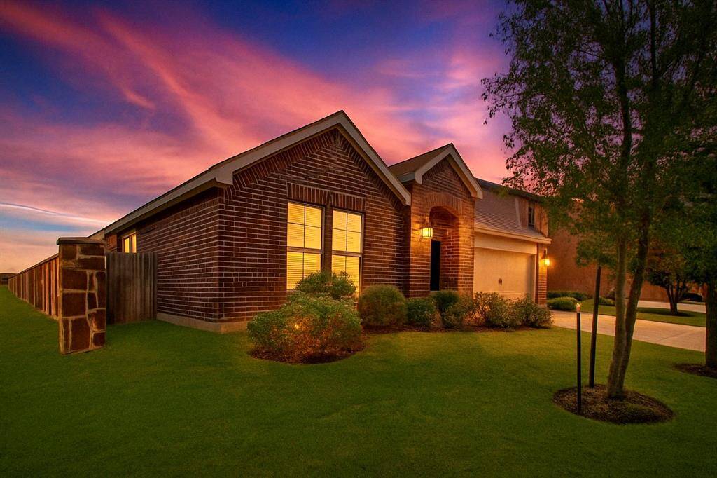 Nestled on a prime corner lot, this home offers stunning views of a serene community lake and nearby walking trails.