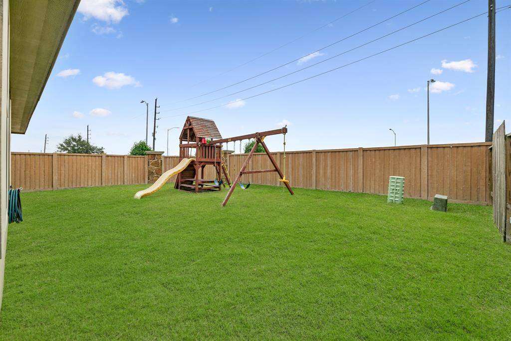 Expansive backyard perfect for your dream garden, play area, or outdoor retreat.