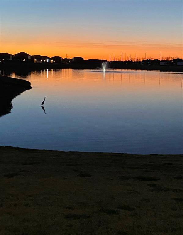 Stunning lake and fountain views await just across the street, perfect for serene sunset evenings.