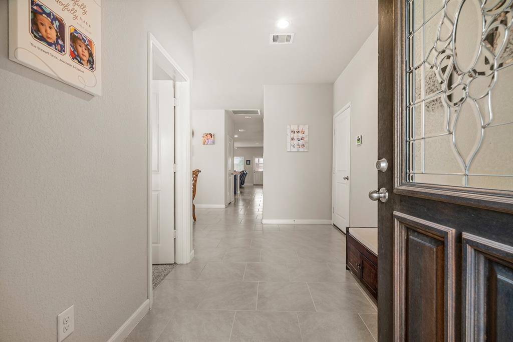 Spacious entryway perfect for showcasing your favorite art and photos.