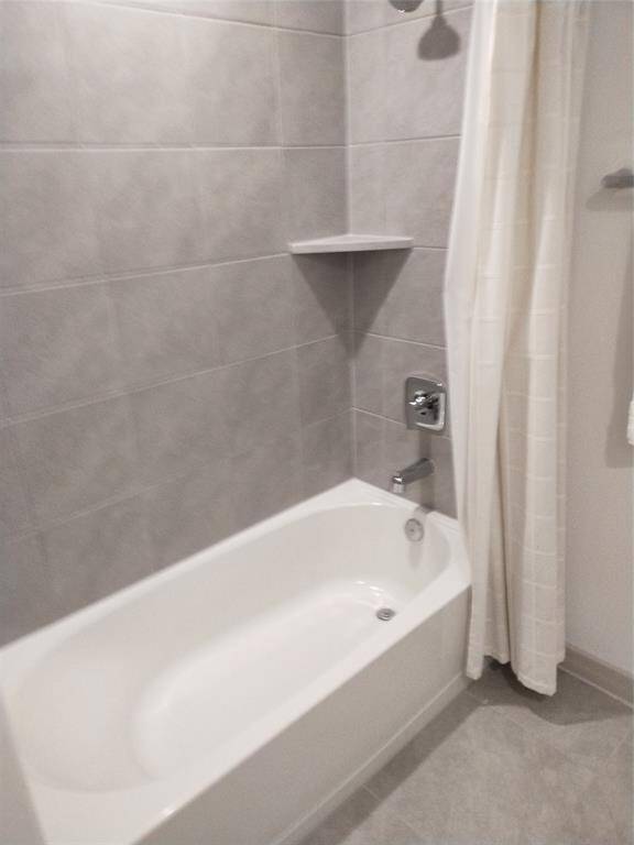 Hall bath looks like new.