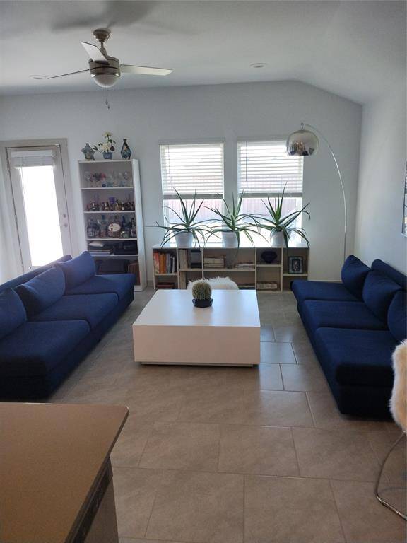Never too many views of the beautiful living room with the high ceilings.