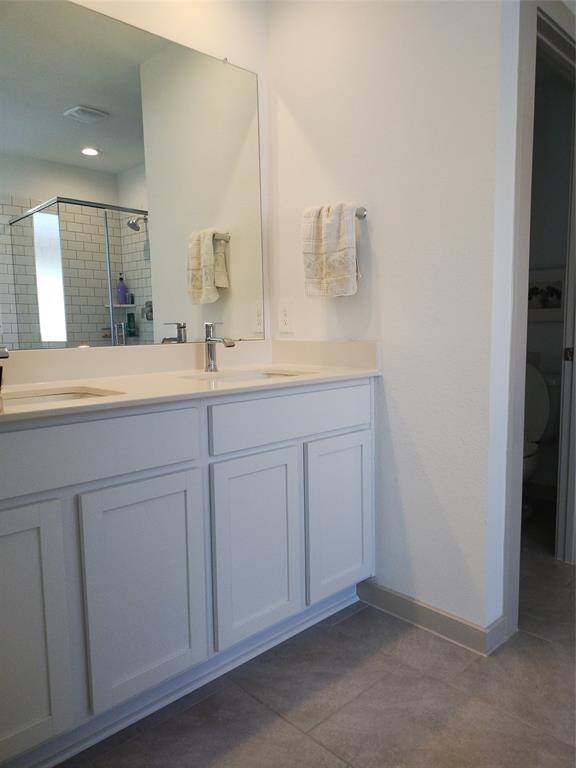 Dual sinks and tile floors