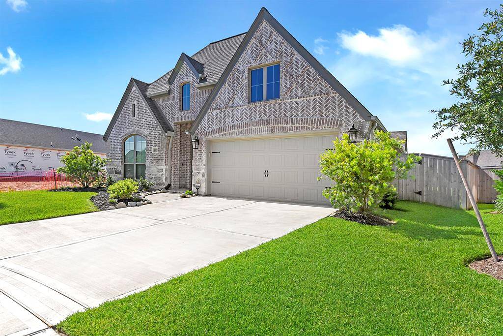 As you approach, you’ll notice the long driveway leading up to a spacious 2-car garage, complementing the home’s elegant brick exterior and striking elevation. Located in a prime spot within the neighborhood, this home combines curb appeal, comfort, and convenience in one perfect package.As you approach, you’ll notice the long driveway leading up to a spacious 2-car garage, complementing the home’s elegant brick exterior and striking elevation. Located in a prime spot within the neighborhood, this home co