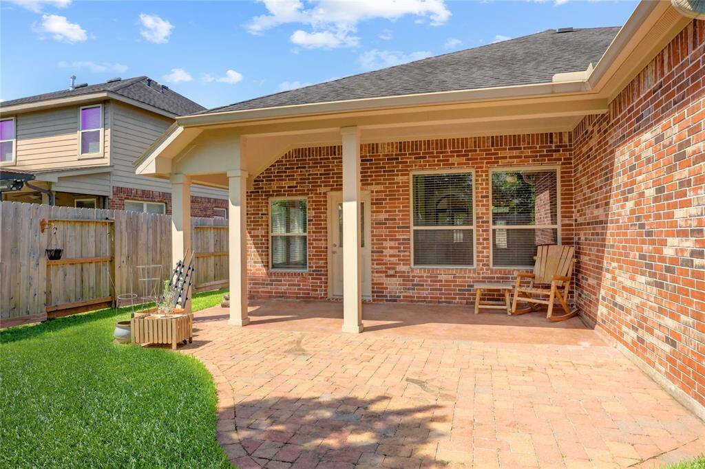 The extended patio offers space for grilling and eating out.
