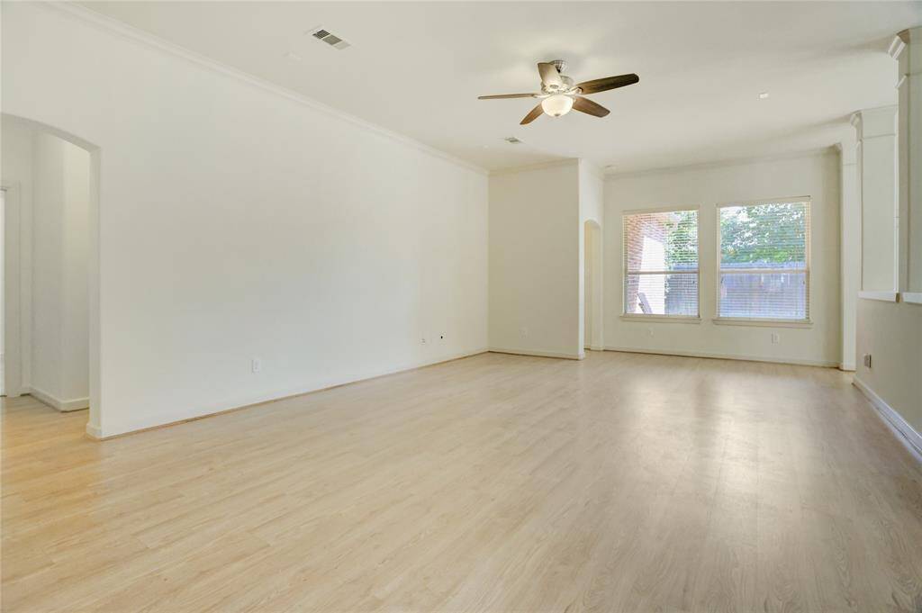 Incredibly large living room allows for oversized comfortable furniture to relax and watch the game.