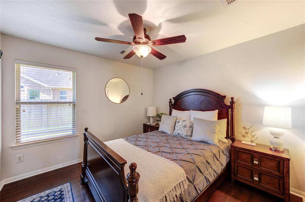 This bright and cozy secondary bedroom provides a peaceful retreat with plenty of space for rest or study. Featuring a spacious closet and flexible layout, it’s ideal for family members or overnight guests