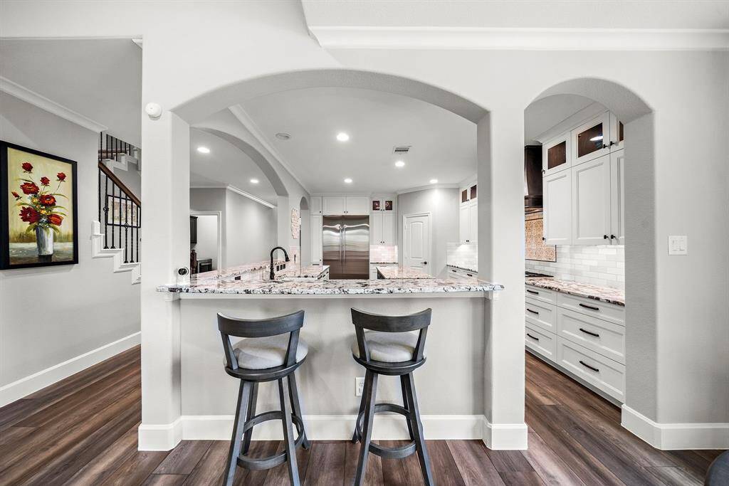 Breakfast bar with seating area.