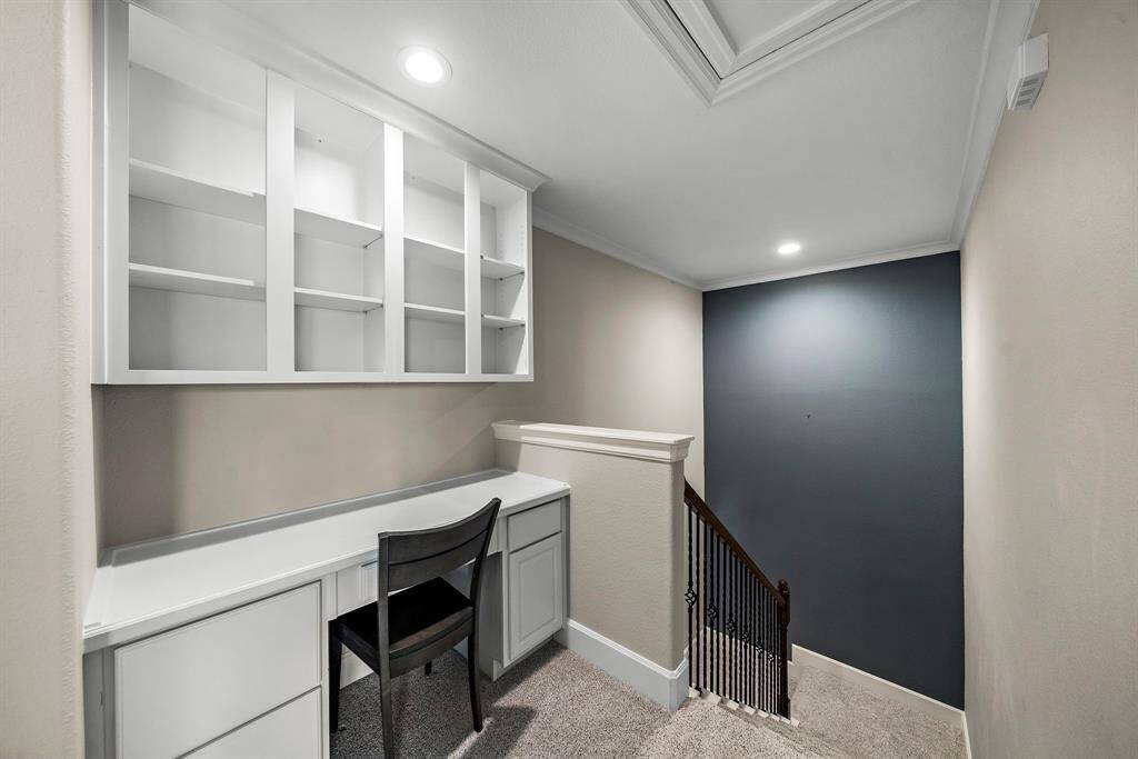 Built-in desk at the landing — perfect for homework or remote work.
