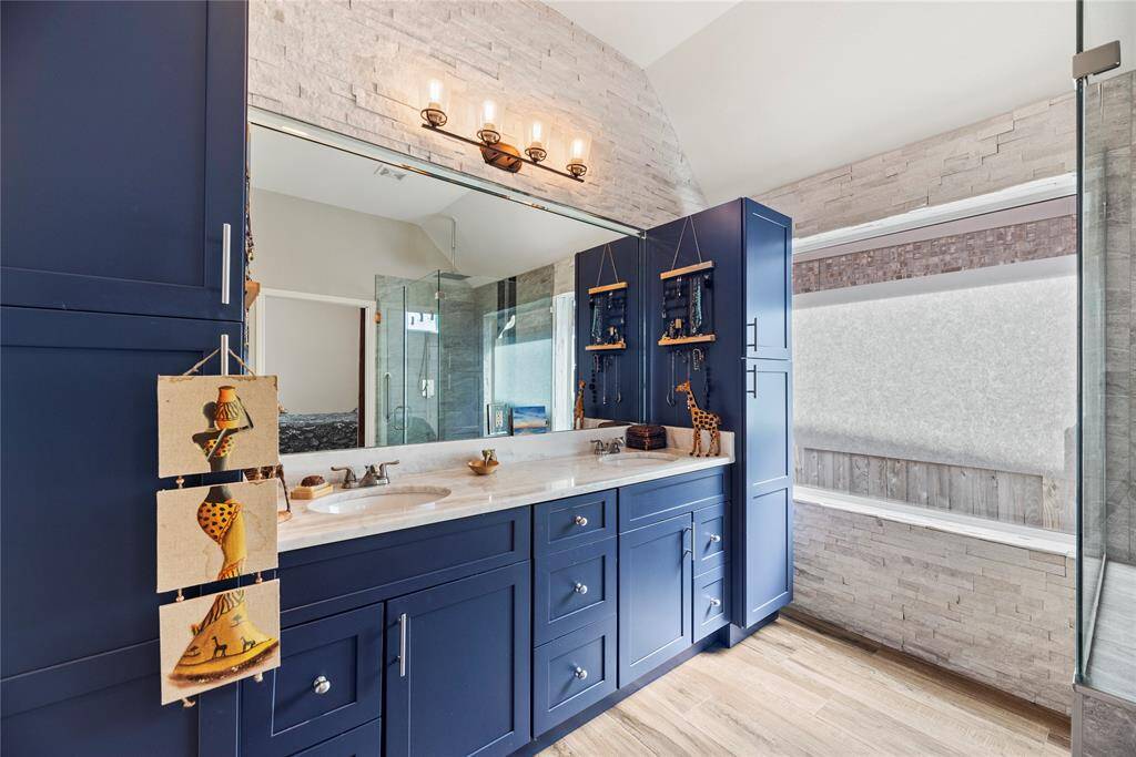 Soft close drawers and marble counter tops with plenty of cabinet space.