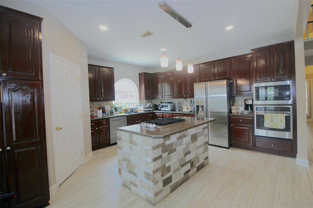 Another kitchen side view