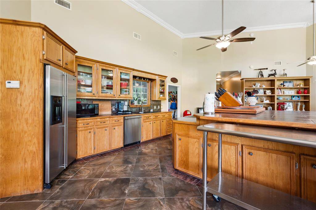 Kitchen view - ceilings are very tall in the main areas of the home.