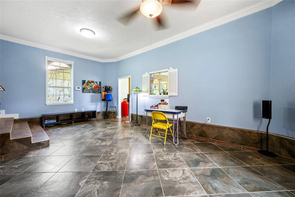 Bonus room view has window through to the kitchen.