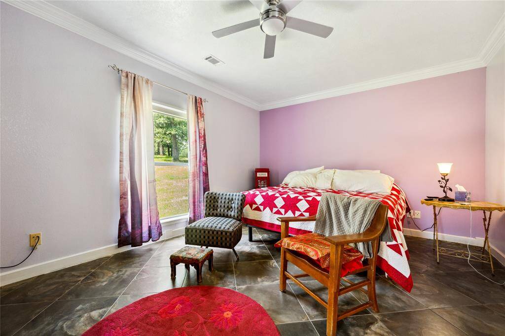 Owner's bedroom to the left side of home. Window provides a spectacular view every single day when you wake up!