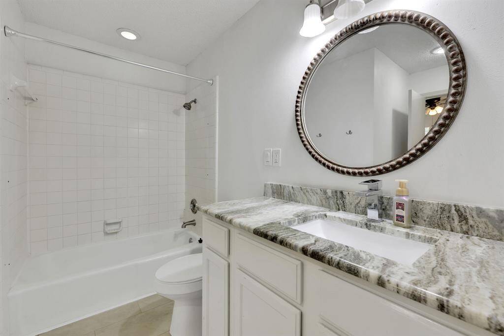 Guest bath featuring modern updates and stylish fixtures.