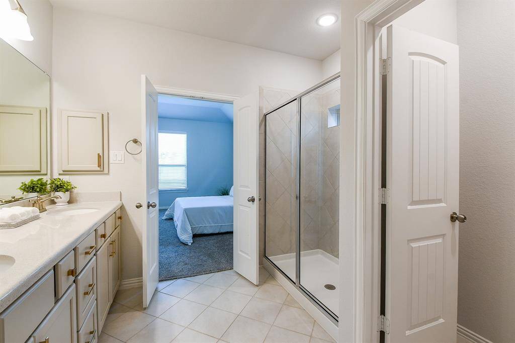 PRIMARY BATH WITH DOUBLE SINKS AND WALK-IN SHOWER