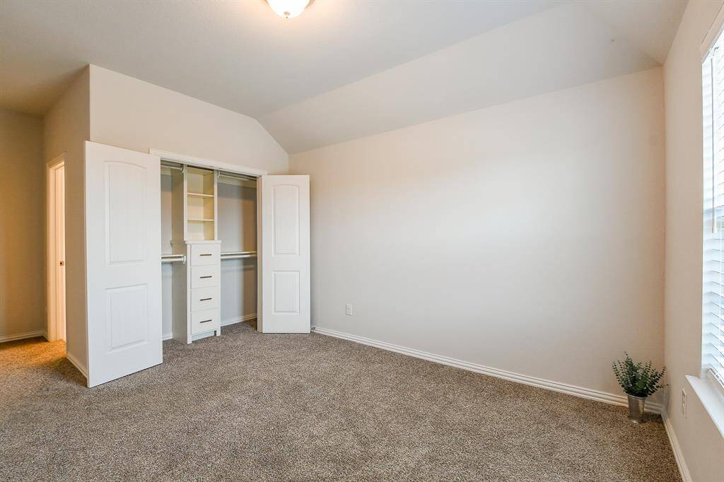 4TH BEDROOM HAS UPGRADED CLOSET SYSTEM
