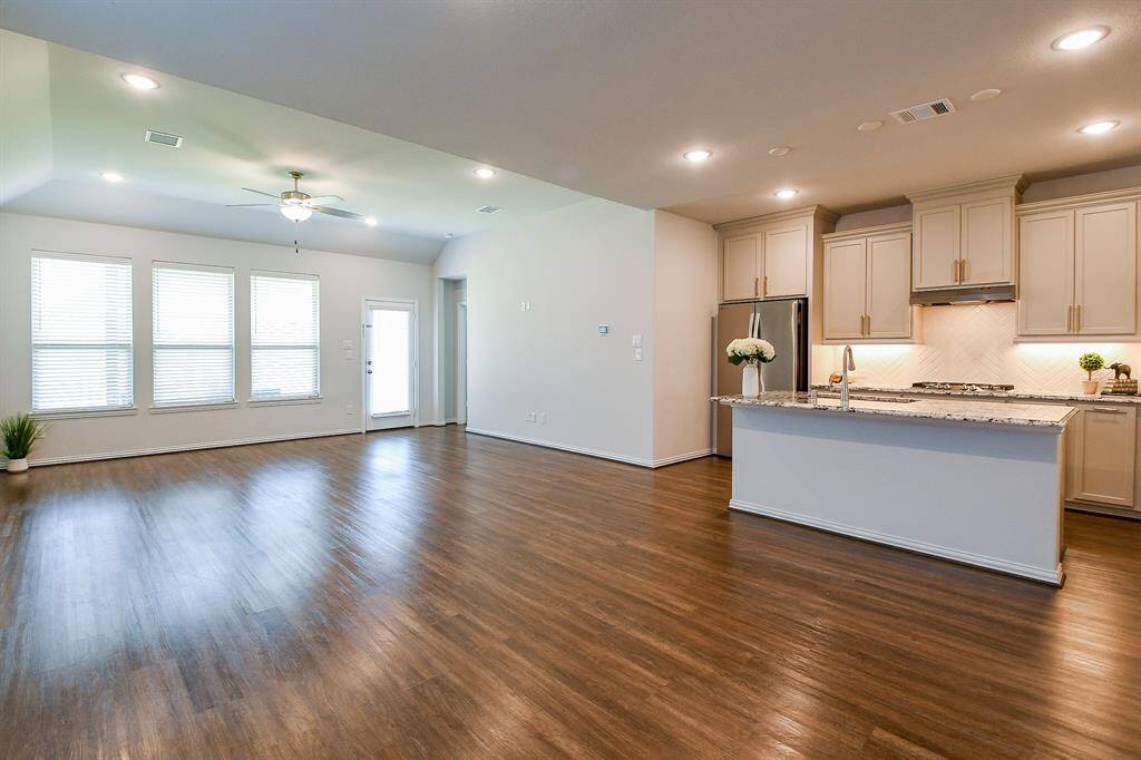 KITCHEN IS OPEN TO DINING AND FAMILY ROOM