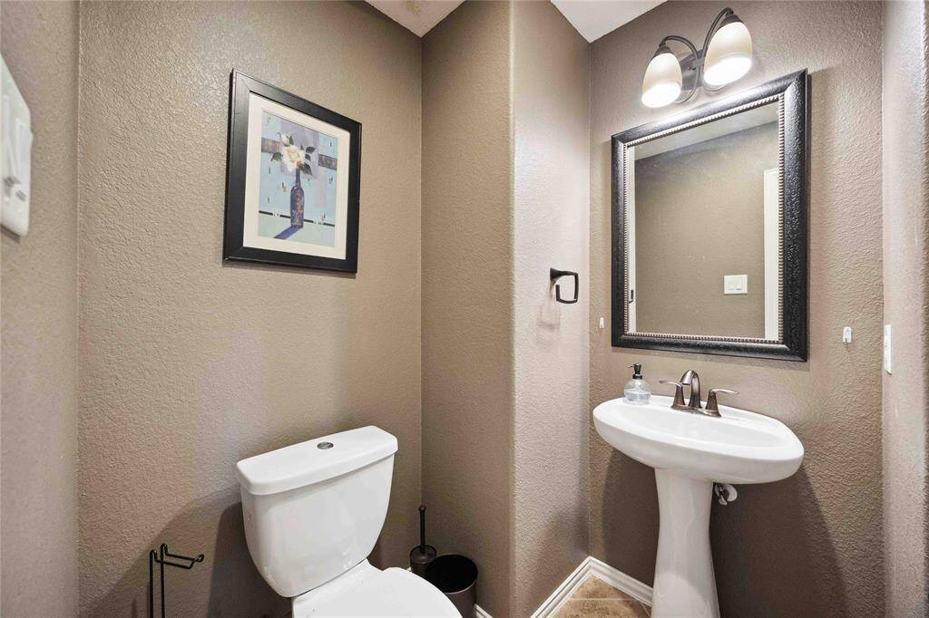 Half-bath off of game room.