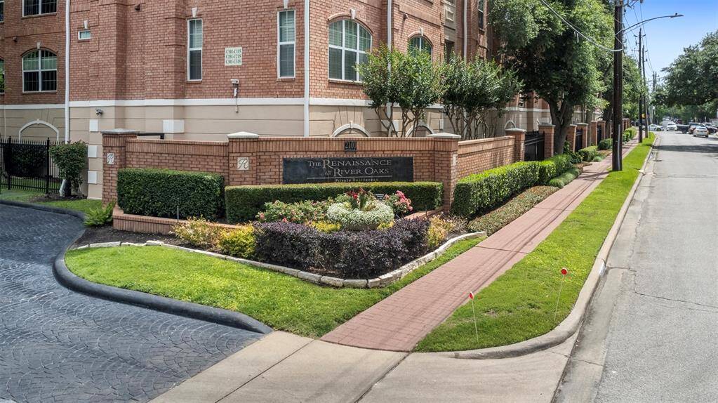 Official entrance to the Private Residences at River Oaks with 24-hour security guard