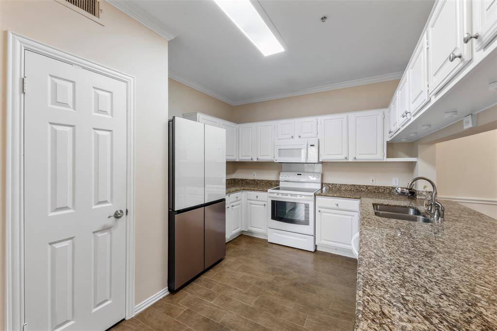 Kitchen with pantry door view