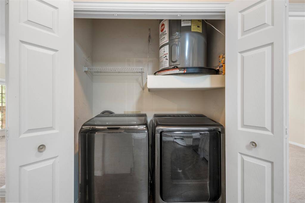 Washer and dryer access right off the primary bedroom