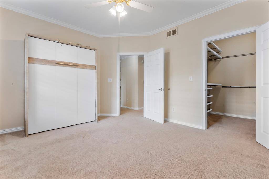 Secondary bedroom on opposite side of primary bedroom for privacy. Includes full-size murphy bed from (mattress not included)
