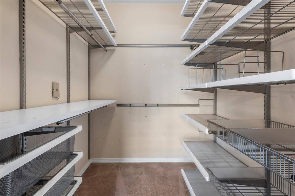 Built-in storage in secondary bedroom closet
