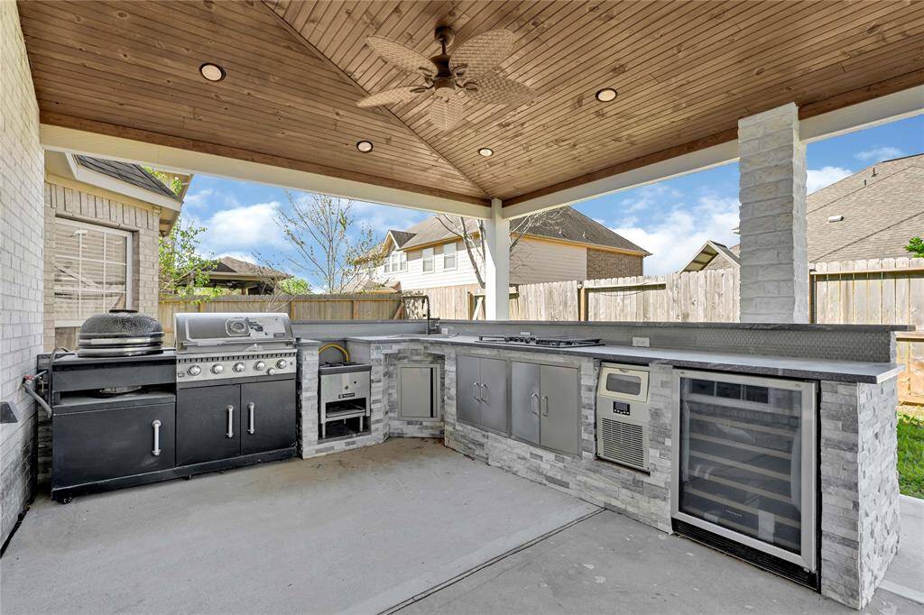Covered deck with outdoor kitchen