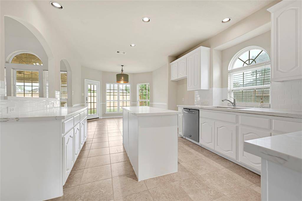 New quartz counter tops and stainless steel appliances