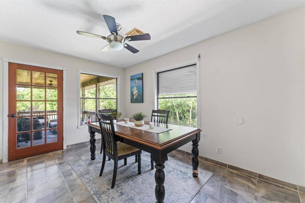Enjoy looking out over the pool from the dining room